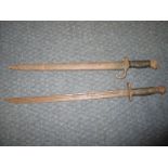 A 1901 bayonet and a German WWI example with scabbard