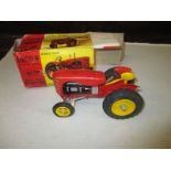 A mint boxed 1950's Lincon Toys diecast Massey Harris tractor