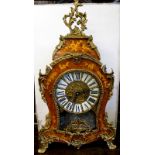 A continental mantle clock with inlaid case and ormolu mounts