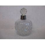 A silver mounted hand cut lead crystal scent bottle