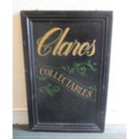 A vintage painted advertising sign for Clares Collectables