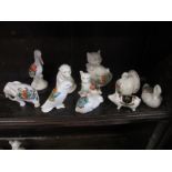 A small collection of crested china animals with local place names