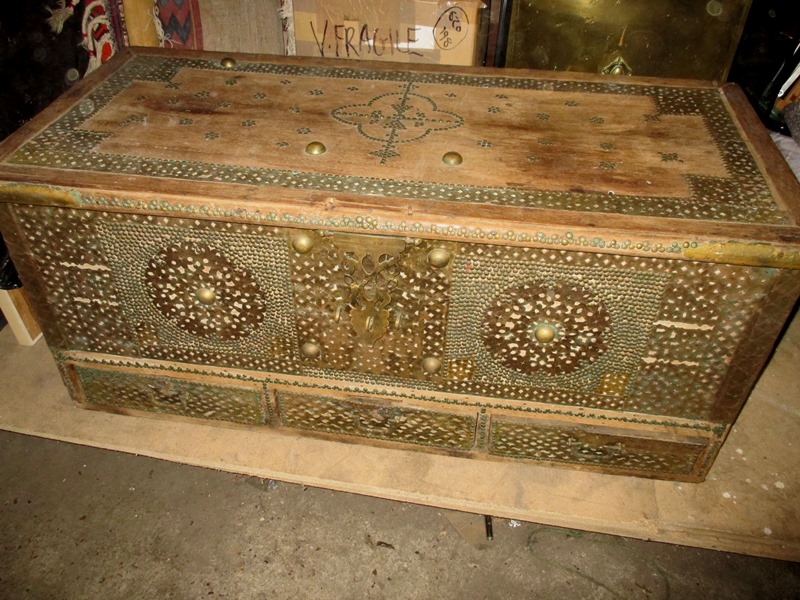 A vintage Oman wedding chest with leather and brass decoration