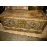 A vintage Oman wedding chest with leather and brass decoration