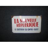 A vintage French enamel advertising sign "La Nouvelle Republique"