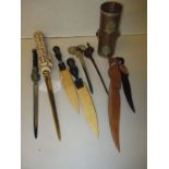 A quantity of vintage letter openers