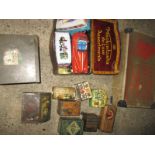 A quantity of vintage advertising tins and a case