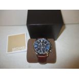 A mens Michael Kors chronograph watch in original box with paperwork