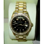 A late 1970’s 18ct gold cased diamond set Rolex oyster perpetual day-date superlative chronometer