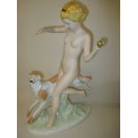 A Royal Dux art deco figure of a naked woman with hound
