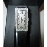 A mid 1920's Art Deco platinum and diamond cased ladies cocktail watch with good Swiss movement