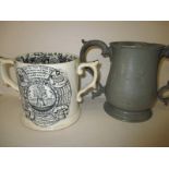 A large 19th century farmers prayer mug and a pewter tankard dated 1852 for a boat race