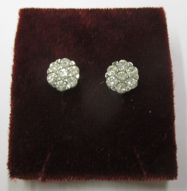 A pair of 9ct gold earrings set with a total diamond weight of 1ct , with a Gemporia certificate