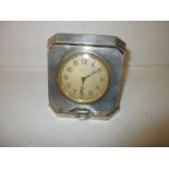 An art deco silver travel clock