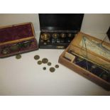 2 cased sets of coin scales and a set of scientific weights