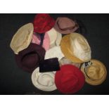 A quantity of vintage hats