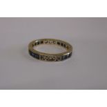 A 9ct gold diamond and sapphire band ring