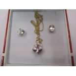 A 9ct gold necklace with diamond and amethyst pendant and a pair of 9ct earrings mounted with