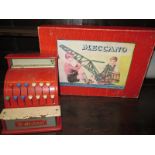 A boxed Meccano outfit no2 and a childs tin plate shop till