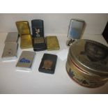 A small collection of zippo lighters