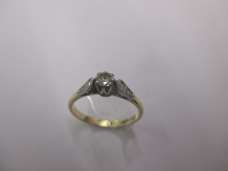 An 18ct gold and platinum Diamond solitaire ring