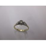 An 18ct gold and platinum Diamond solitaire ring