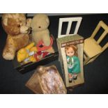 A group of vintage teddies, dolls and doll chairs