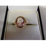 A 9ct gold ring set with a cameo