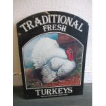 A double sided 'Traditional Fresh Turkey' sign