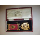 A 9ct gold masonic jewel in original box, approximate weight 32.5g