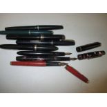 A quantity of vintage fountain pens