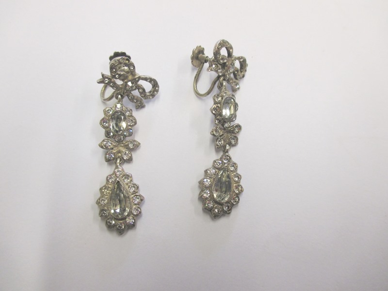 A pair of antique screw on paste earrings