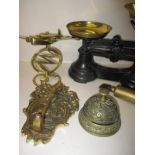 A selection of brass items to include weighing scales and a plane on stand