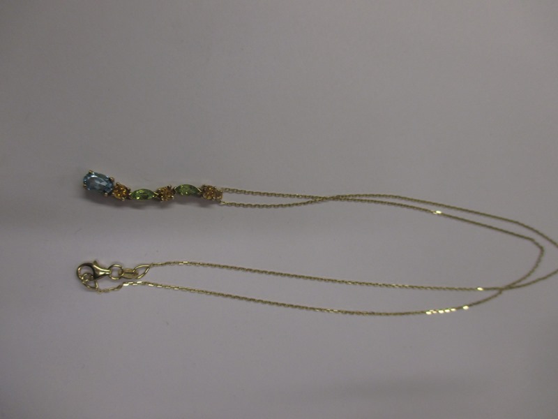 A 9ct gold necklace with citrine, topaz and peridot pendant