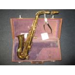 An early 20th century cased saxophone by C G Conn Ltd, SN 166765