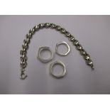 Three sterling silver hexagonla dress rings marked Gucci and a silver bracelet