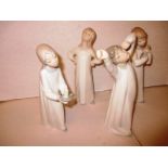 Four retired Lladro figures