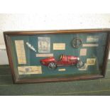 A motoring diorama depicting 'The History of car racing'