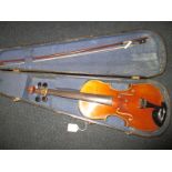A violin in hard case with bow marked 'Lupot'