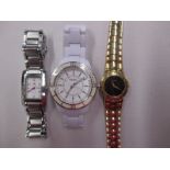 A Gucci, Fossil and Tommy Hilfiger ladies wristwatch