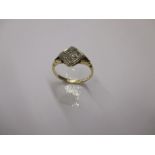 An 18ct gold ring set with 9 diamonds in a square formation