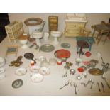 A quantity of 1920s and later dolls house accessories