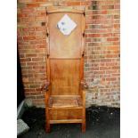 An Edwardian hall stand with cupboard seat