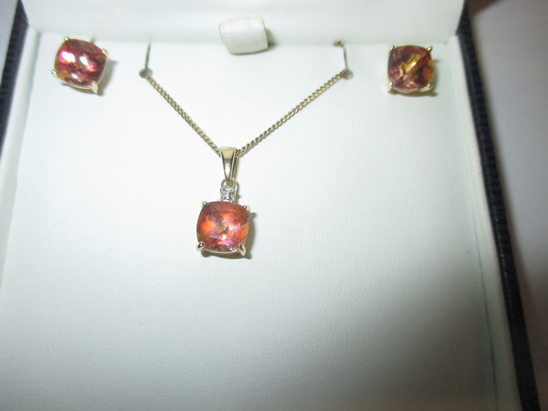 A 9ct gold necklace and earrings set, set with mystic topaz