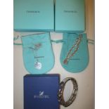 A Tiffany silver bracelet and necklace and a Swarovski bracelet