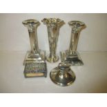 A pair of silver candlesticks, and other silver items