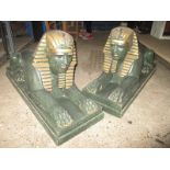 Two fiberglass film prop sphynxes