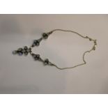 A silver and moonstone necklace