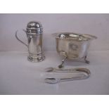 A late Victorian sterling silver cinnamon shaker and a 1930s silver sugar bowl