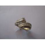 A 9ct gold ring set with baguette diamonds